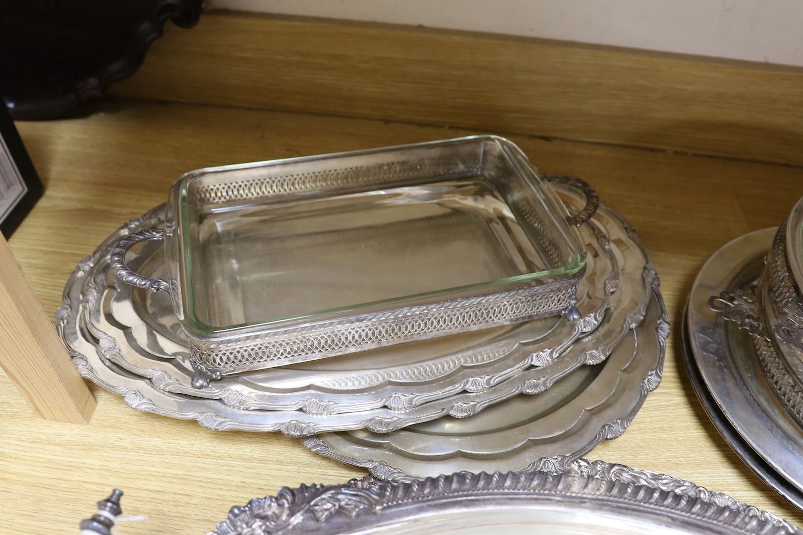 A quantity of various plated wares including a set of oval serving dishes and two-handled dishes